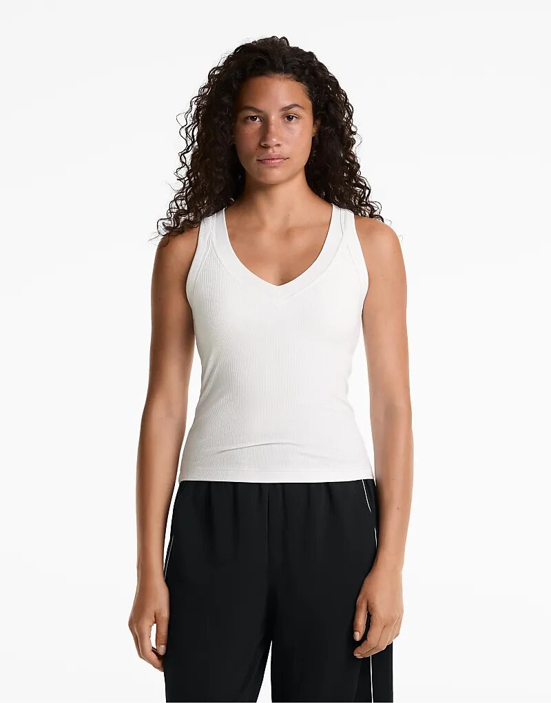 Майка OYSHO Rib из смеси модала белого цвета
Майка OYSHO Rib из смеси модала белого цвета