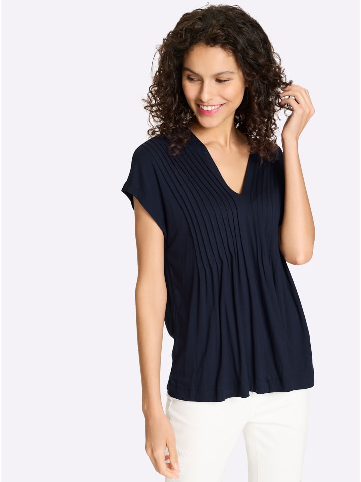 Темно-синяя рубашка Heine
Темно-синяя рубашка Heine