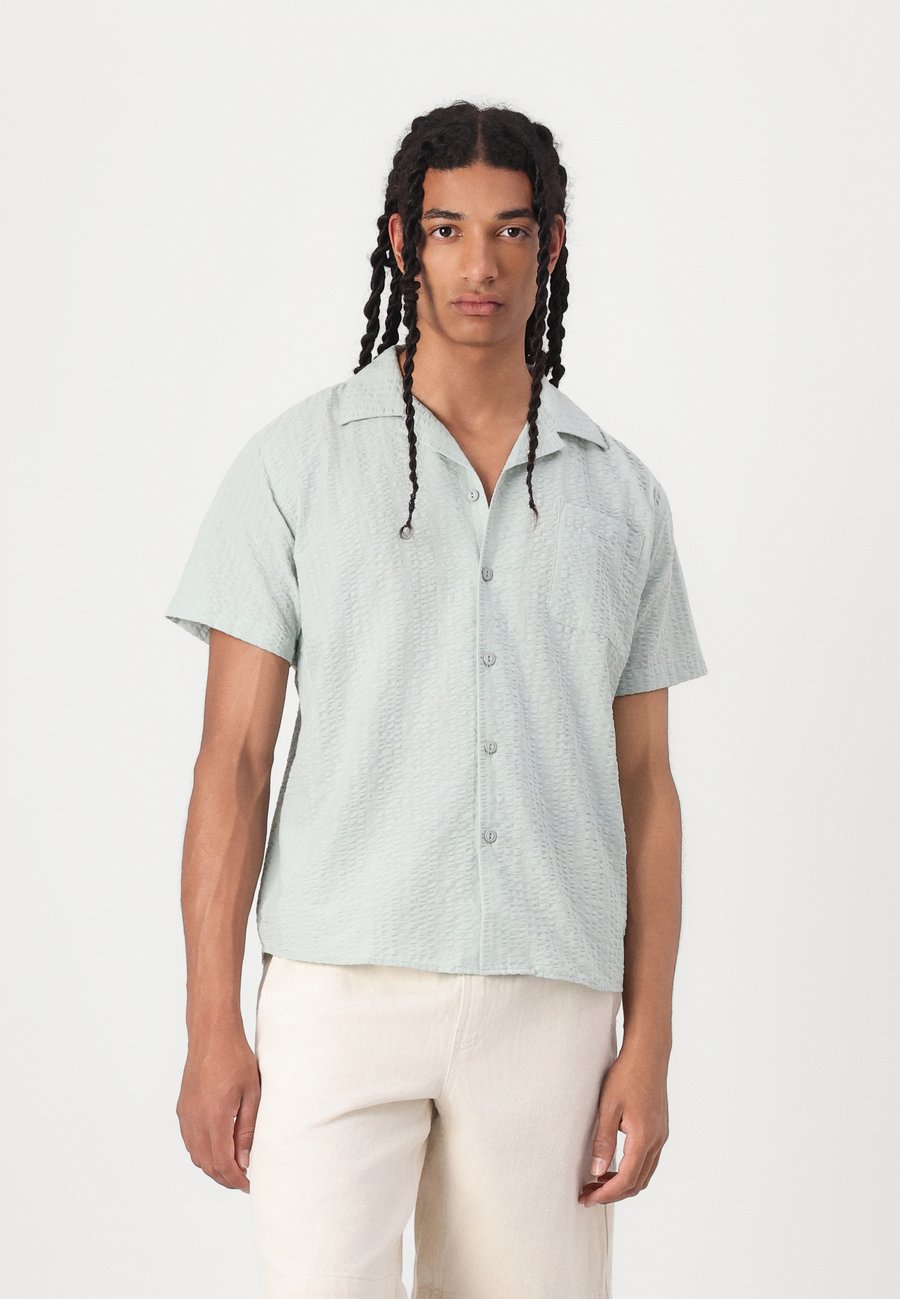 Блуза Kaotiko BIG SEERSUCKER, Blue
Блуза Kaotiko BIG SEERSUCKER, Blue