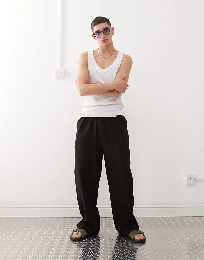 Текстурированные тканые брюки COLLUSION черного цвета
Текстурированные тканые брюки COLLUSION черного цвета