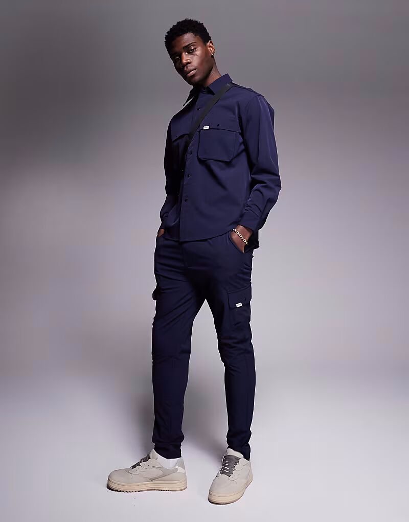 Шестого июня брюки карго в темно-синем цвете Sixth June
Шестого июня брюки карго в темно-синем цвете Sixth June