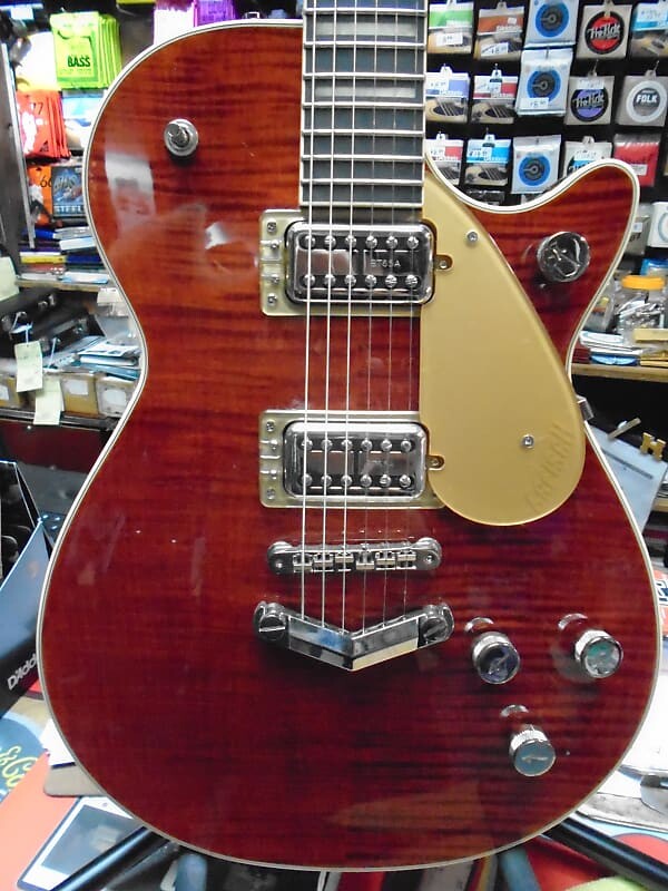 Электрогитара Gretsch G6228FM-PE Players Edition Duo Jet BT Single Cutaway Flamed Maple 2019 Bourbon flame
Электрогитара Gretsch G6228FM-PE Players Edition Duo Jet BT Single Cutaway Flamed Maple 2019 Bourbon flame