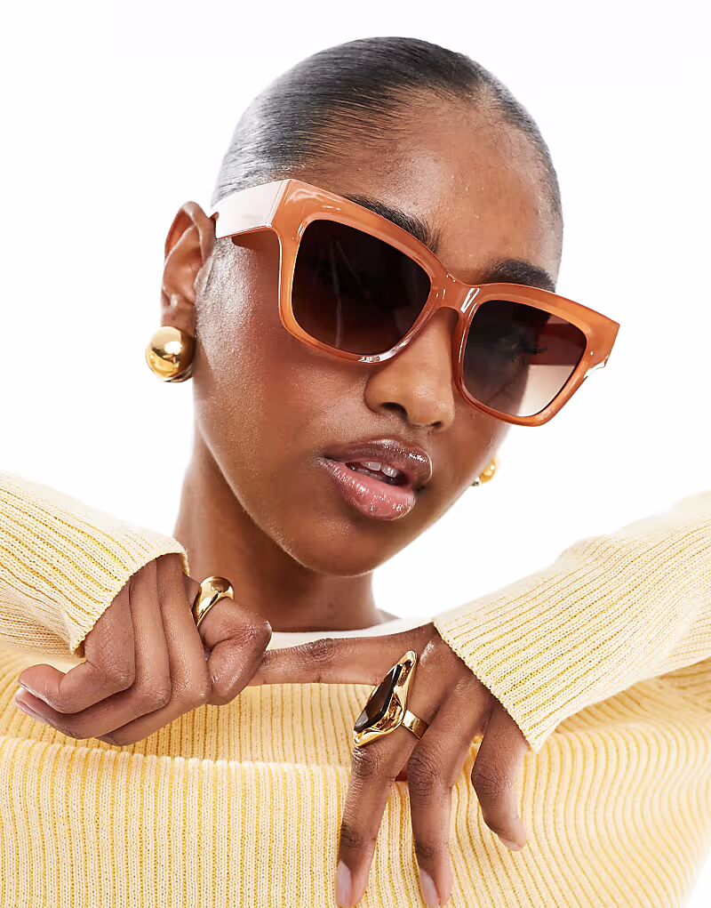 Солнцезащитные очки AJ Morgan в массивной квадратной оправе янтарного цвета
Солнцезащитные очки AJ Morgan в массивной квадратной оправе янтарного цвета