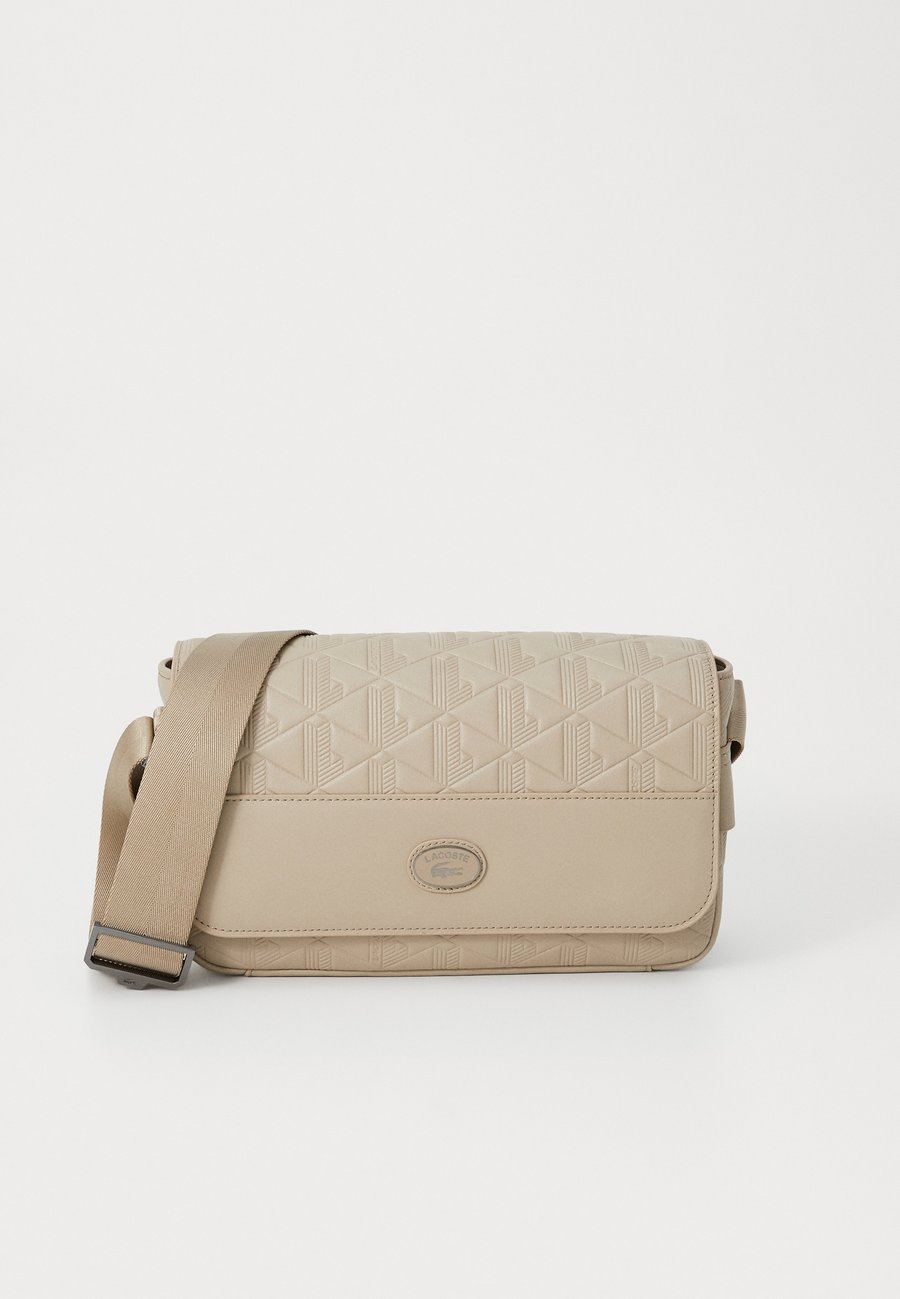Сумка кросс-боди Lacoste CROSSOVER BAG NOMOGRAMME UNISEX, Simply Taupe/Black
Сумка кросс-боди Lacoste CROSSOVER BAG NOMOGRAMME UNISEX, Simply Taupe/Black
