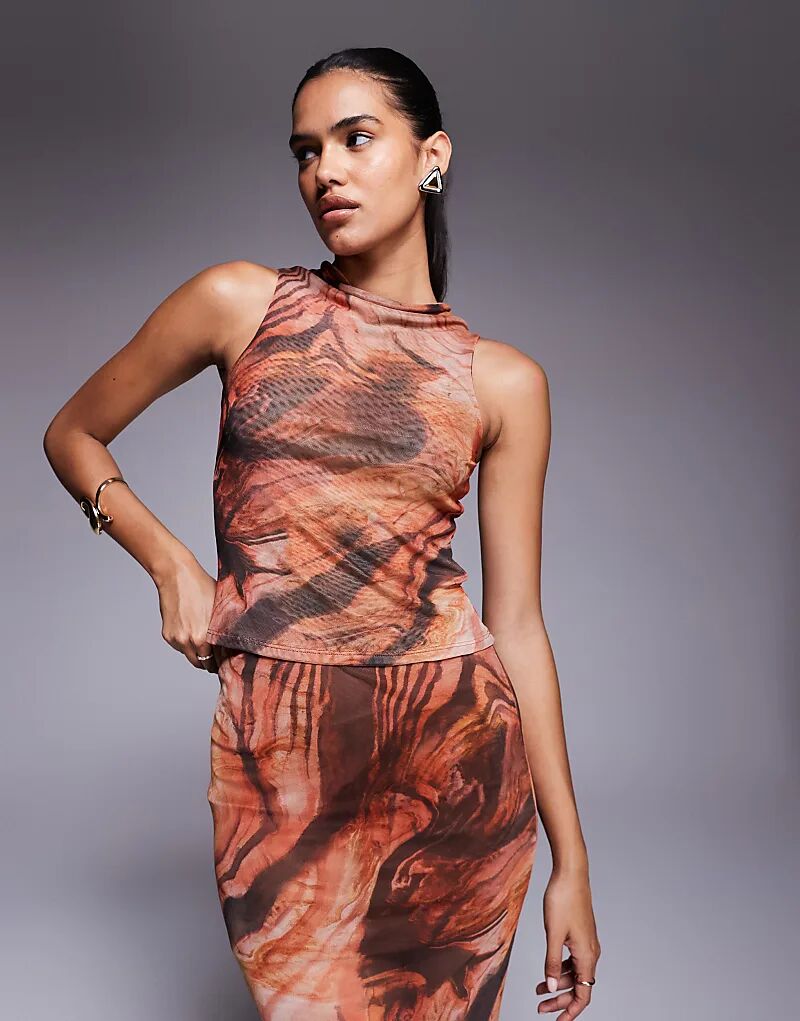 Майка-борцовка ASOS DESIGN из прозрачной сетки с высоким воротником-хомутом и оранжевым абстрактным принтом, комбинируемая и сочетаемая
Майка-борцовка ASOS DESIGN из прозрачной сетки с высоким воротником-хомутом и оранжевым абстрактным принтом, комбинируемая и сочетаемая