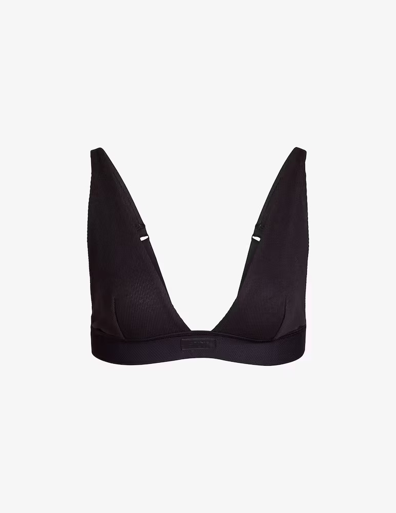 Бюстгальтер без косточек с глубоким вырезом SKIMS, цвет Soot
Бюстгальтер без косточек с глубоким вырезом SKIMS, цвет Soot