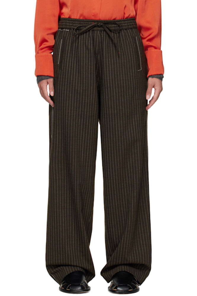 Коричневые свободные брюки пошива Cordera
Коричневые свободные брюки пошива Cordera