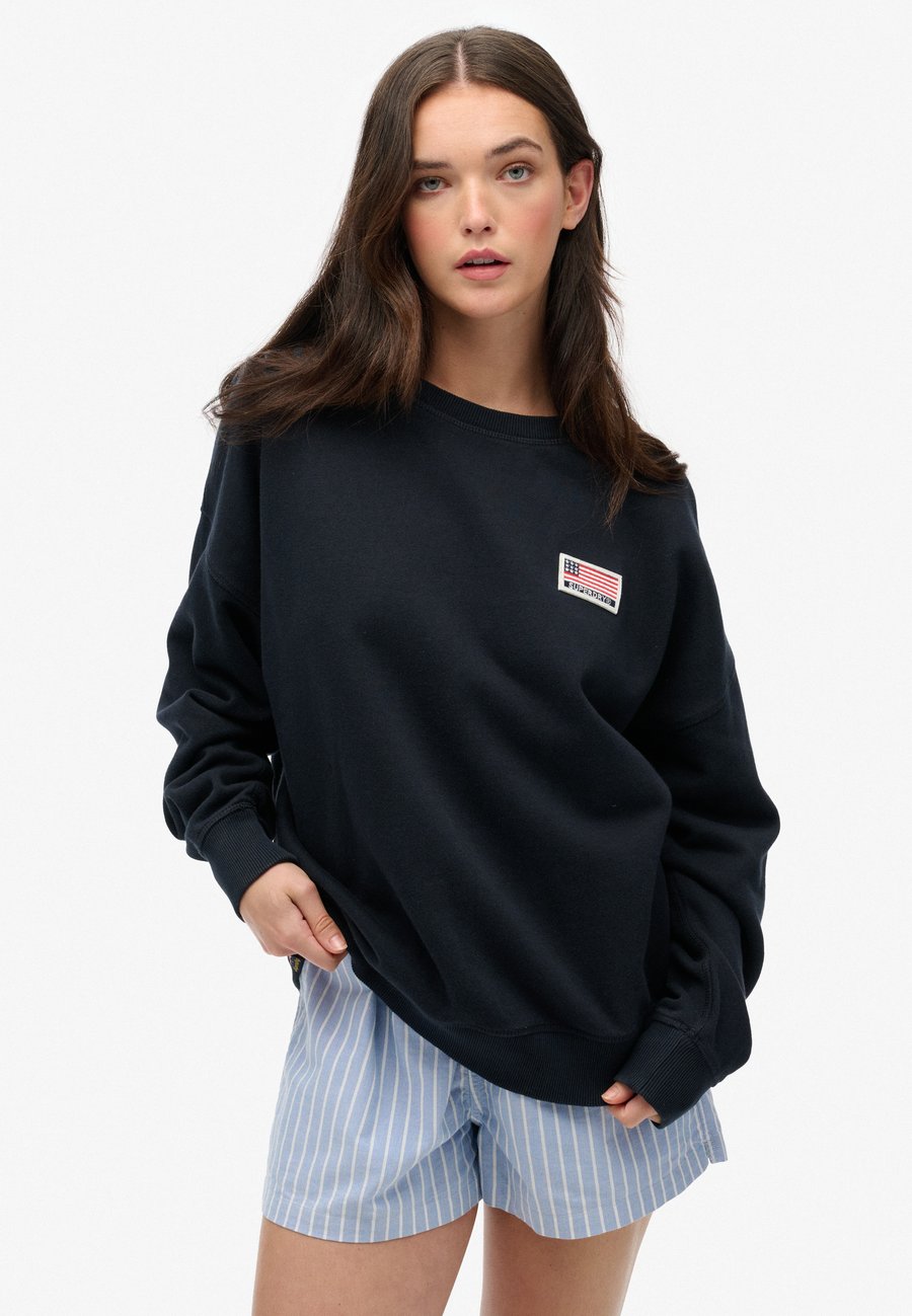 Толстовка Superdry & Co SUPERDRY ATHLETIC ESSENTIALS RELAXED CREW , Eclipse Navy/Blue
Толстовка Superdry & Co SUPERDRY ATHLETIC ESSENTIALS RELAXED CREW , Eclipse Navy/Blue