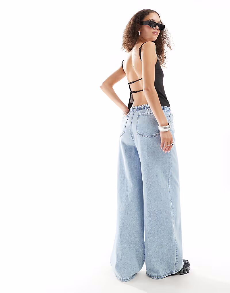 Топ Weekday Micha с открытой спиной, черный
Топ Weekday Micha с открытой спиной, черный