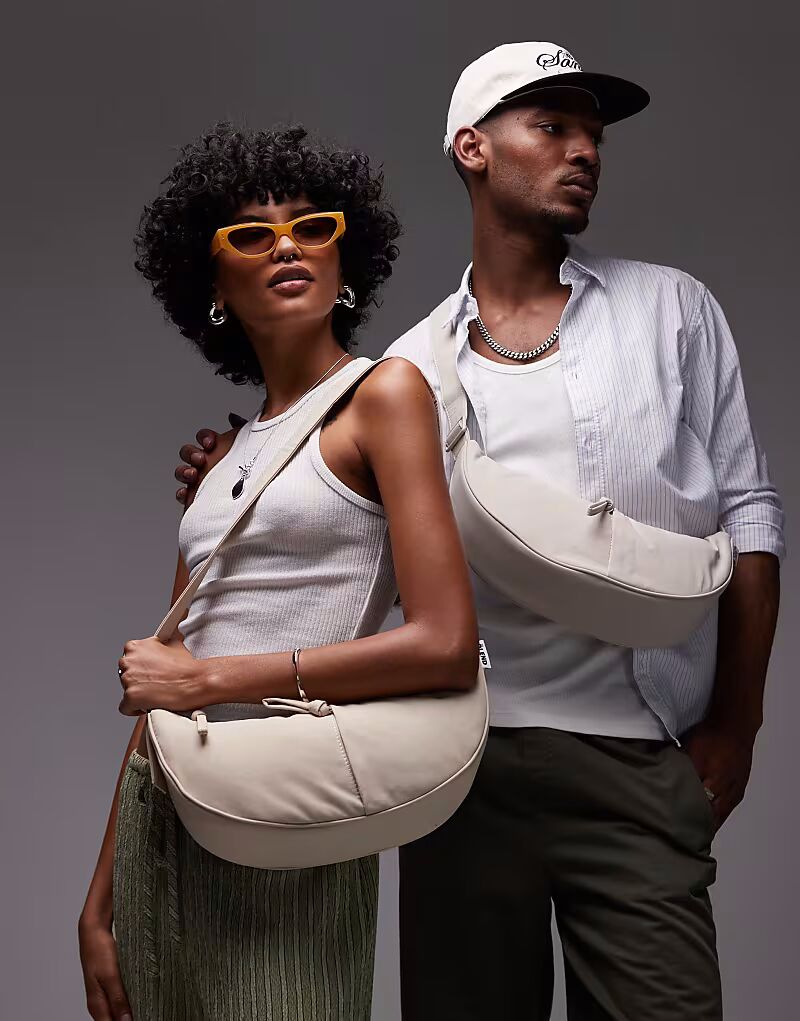 OLEND - Moon - Сумка через плечо из нейлона в форме полумесяца песочного цвета
OLEND - Moon - Сумка через плечо из нейлона в форме полумесяца песочного цвета