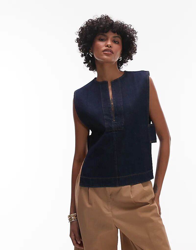 Джинсовая майка ARKET цвета индиго с эффектом полоскания
Джинсовая майка ARKET цвета индиго с эффектом полоскания