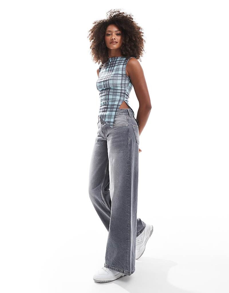 ASOS DESIGN – синий асимметричный топ в клетку с вырезом «лодочка»
ASOS DESIGN – синий асимметричный топ в клетку с вырезом «лодочка»