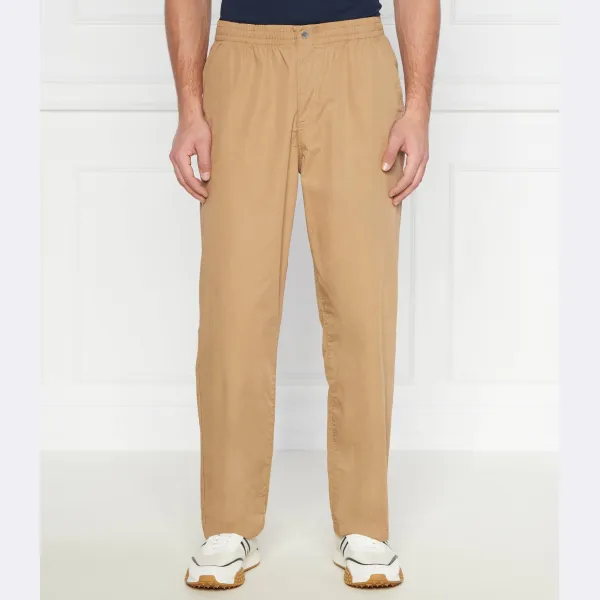 Спортивные костюмы и спортивные брюки свободного кроя Lacoste, бежевый 
Спортивные костюмы и спортивные брюки свободного кроя Lacoste, бежевый