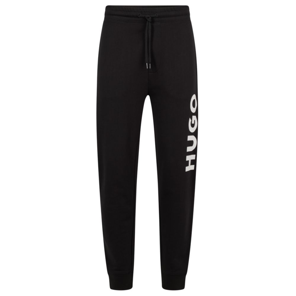 Спортивные брюки на завязках из французского трикотажа с большим логотипом HUGO, черный
Спортивные брюки на завязках из французского трикотажа с большим логотипом HUGO, черный