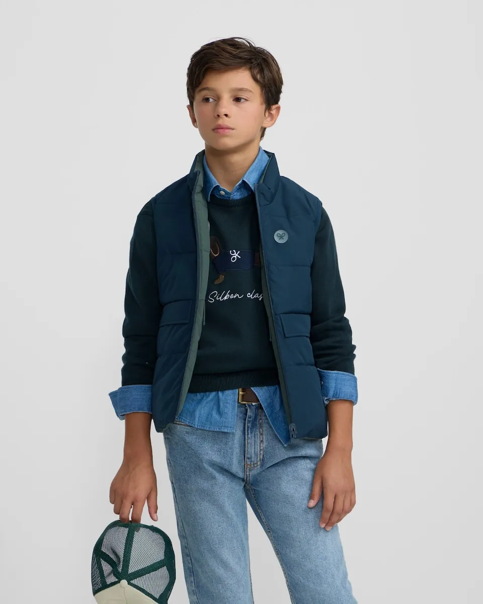 Двусторонний детский жилет темно-синего цвета Silbon
Двусторонний детский жилет темно-синего цвета Silbon