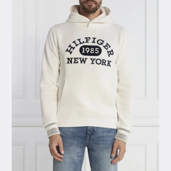 Однотонное студенческое худи классического кроя Tommy Hilfiger, экрю
Однотонное студенческое худи классического кроя Tommy Hilfiger, экрю