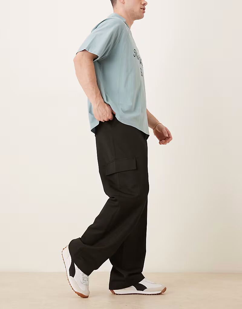 Широкие брюки-карго ASOS DESIGN черного цвета с эластичной талией
Широкие брюки-карго ASOS DESIGN черного цвета с эластичной талией