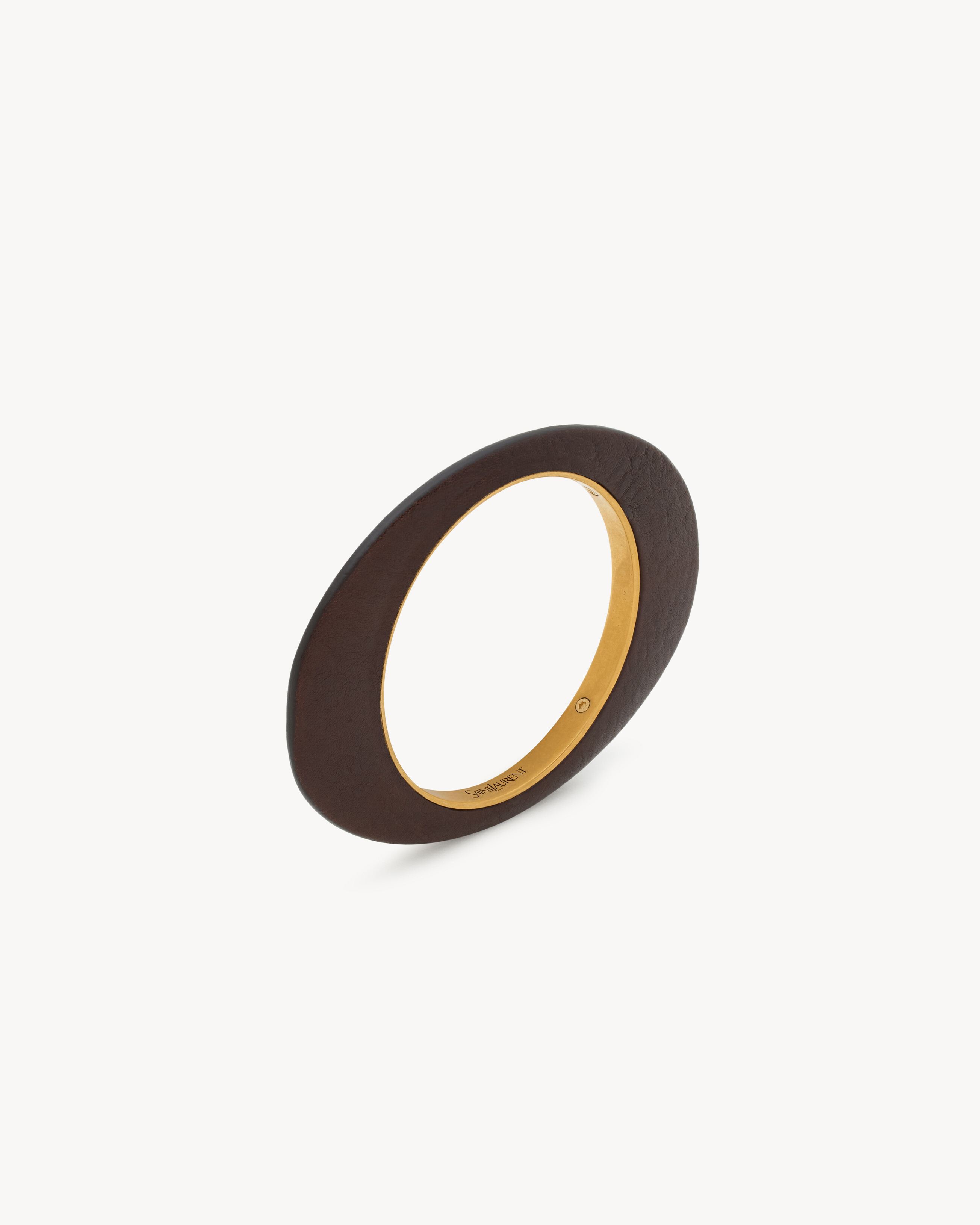 Браслет-кафф из кожи и металла Saint Laurent, коричневый
Браслет-кафф из кожи и металла Saint Laurent, коричневый