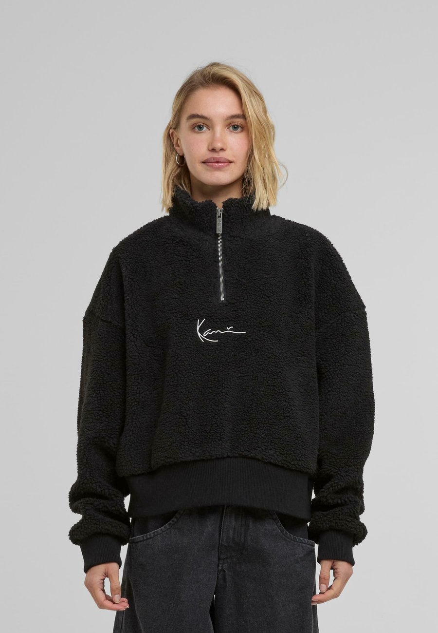 Джемпер Karl Kani SIGNATURE TROYER, Black
Джемпер Karl Kani SIGNATURE TROYER, Black