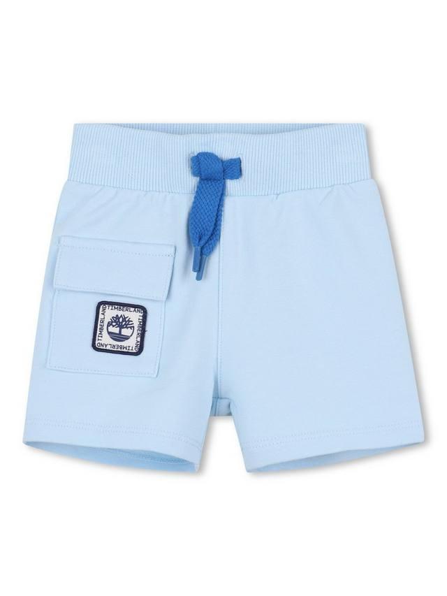 Детские хлопковые шорты с карманами-накладками и кулиской Timberland, Pale Blue
Детские хлопковые шорты с карманами-накладками и кулиской Timberland, Pale Blue