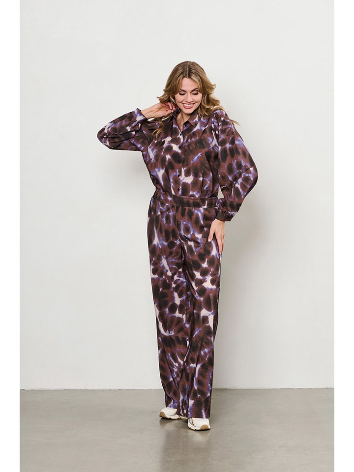 Брюки коричневого/фиолетового цвета &Co Woman
Брюки коричневого/фиолетового цвета &Co Woman