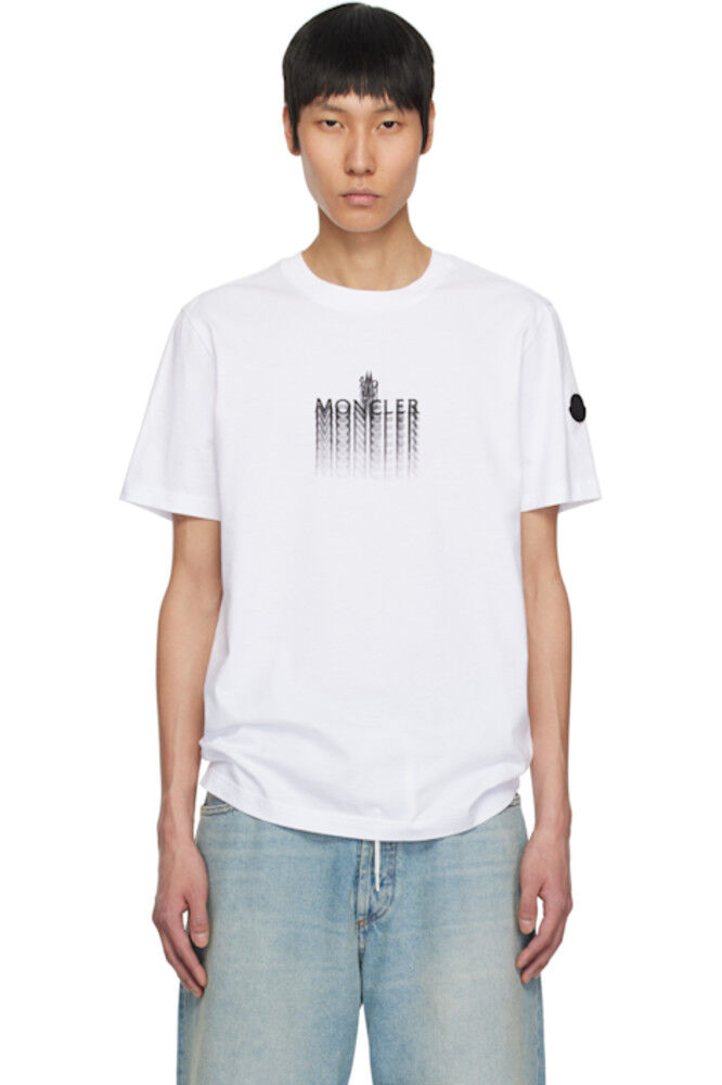 Белая хлопковая футболка с выцветшим логотипом Moncler
Белая хлопковая футболка с выцветшим логотипом Moncler
