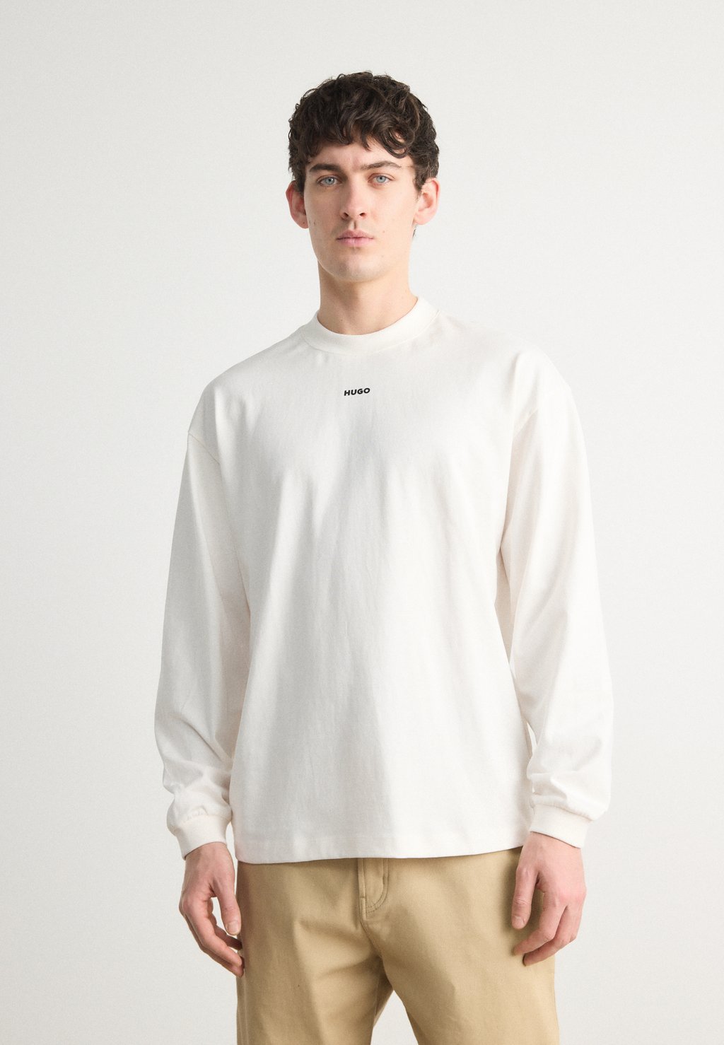 Топ с длинными рукавами DAPOSO HUGO, молочный
Топ с длинными рукавами DAPOSO HUGO, молочный