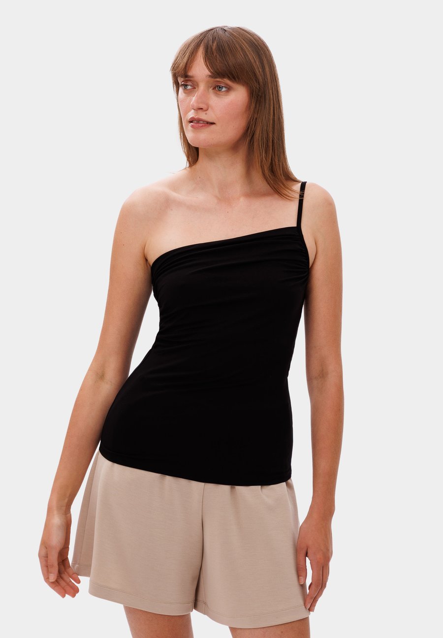 Топ Les Lunes NOVAA ONE SHOULDER, Schwarz/Black
Топ Les Lunes NOVAA ONE SHOULDER, Schwarz/Black