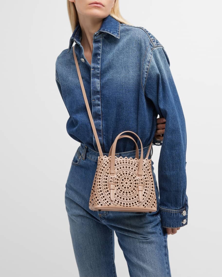 Сумка Mina 20 Vienne с лазерной резкой и верхней ручкой ALAIA, коричневый
Сумка Mina 20 Vienne с лазерной резкой и верхней ручкой ALAIA, коричневый