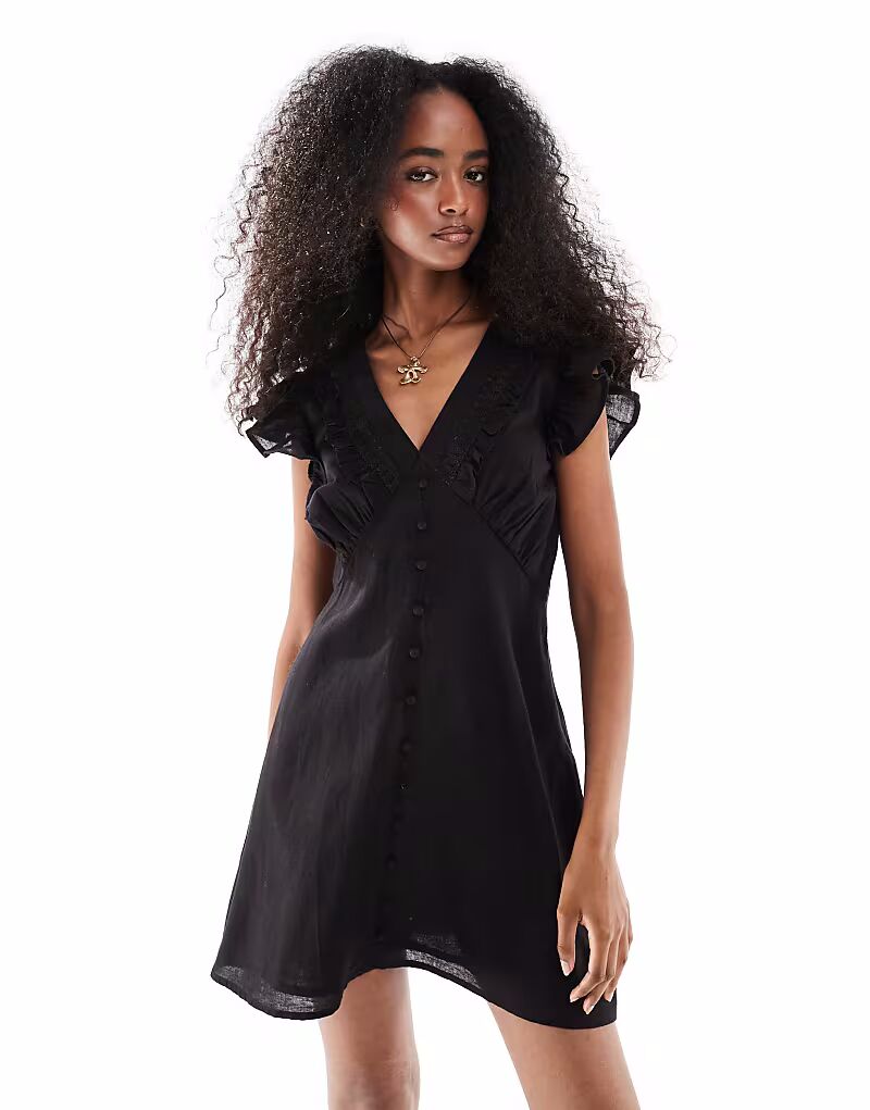 Платье Wednesday's Girl с отделкой крючком и оборками черного цвета
Платье Wednesday's Girl с отделкой крючком и оборками черного цвета