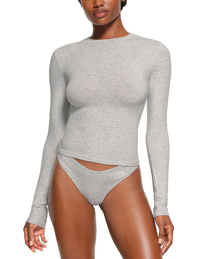 Хлопковая футболка с длинным рукавом SKIMS, серый
Хлопковая футболка с длинным рукавом SKIMS, серый