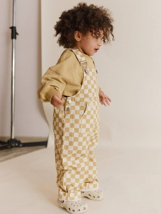 Детские комбинезоны из органического хлопка со средним рисунком в шахматную клетку Claude & Co, цвет Ochre 
Детские комбинезоны из органического хлопка со средним рисунком в шахматную клетку Claude & Co, цвет Ochre