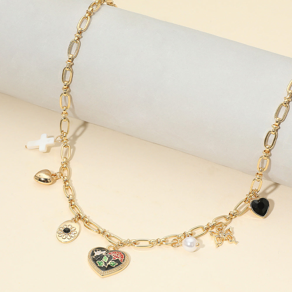 Ожерелье с подвеской в виде сердца с эмалевым узором в виде бабочки и цветка Fashnzfab, черный/золотой
Ожерелье с подвеской в виде сердца с эмалевым узором в виде бабочки и цветка Fashnzfab, черный/золотой