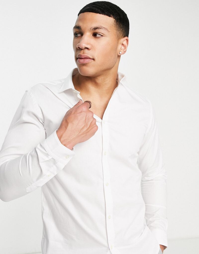 Jack & Jones Premium - белая рубашка узкого кроя
Jack & Jones Premium - белая рубашка узкого кроя