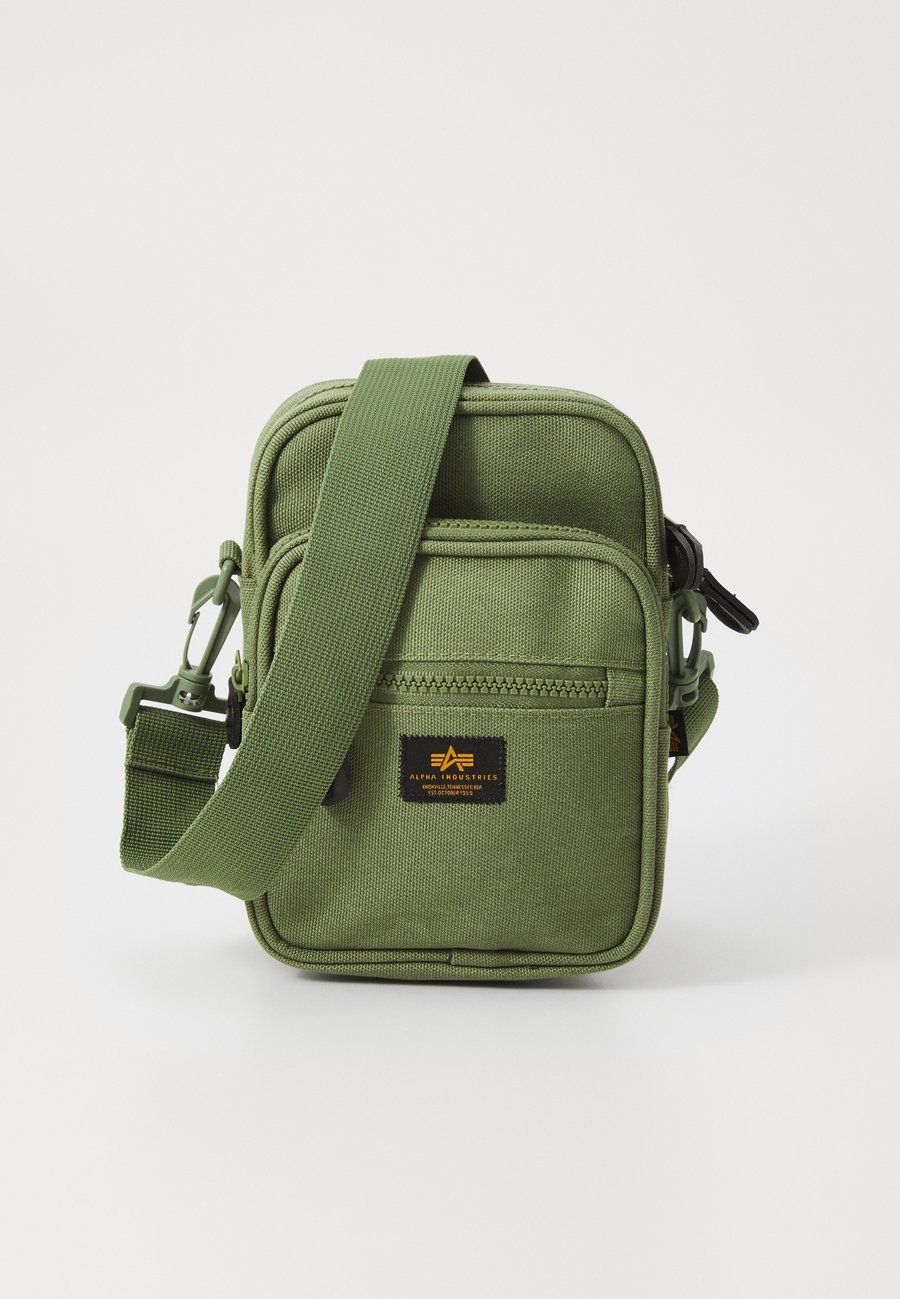 Сумка кросс-боди Alpha Industries LABEL MESSENGER BAG UNISEX, Sage-Green/Green
Сумка кросс-боди Alpha Industries LABEL MESSENGER BAG UNISEX, Sage-Green/Green