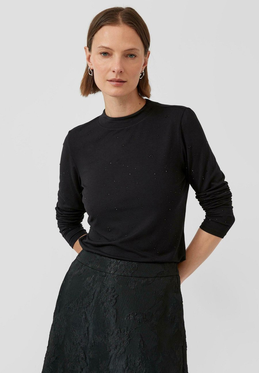 Топ s.Oliver Long sleeved top, Schwarz/Black
Топ s.Oliver Long sleeved top, Schwarz/Black