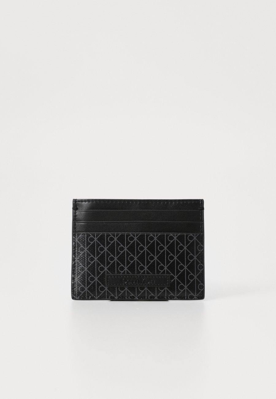 Кошелек Calvin Klein COATED EMBLEM, Black
Кошелек Calvin Klein COATED EMBLEM, Black