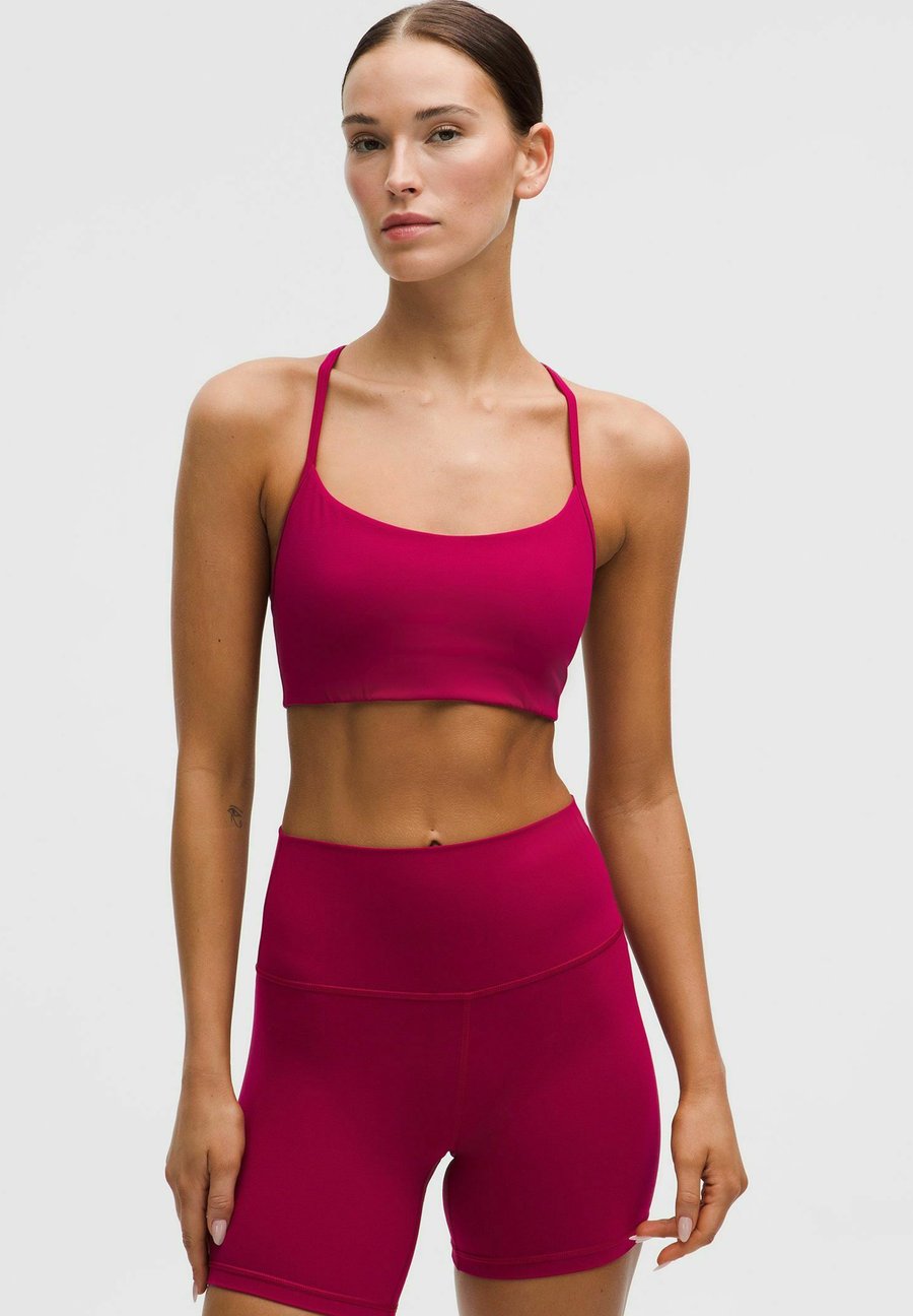 Бюстгальтер lululemon Light support sports bra, Berry Rumble/Blue
Бюстгальтер lululemon Light support sports bra, Berry Rumble/Blue