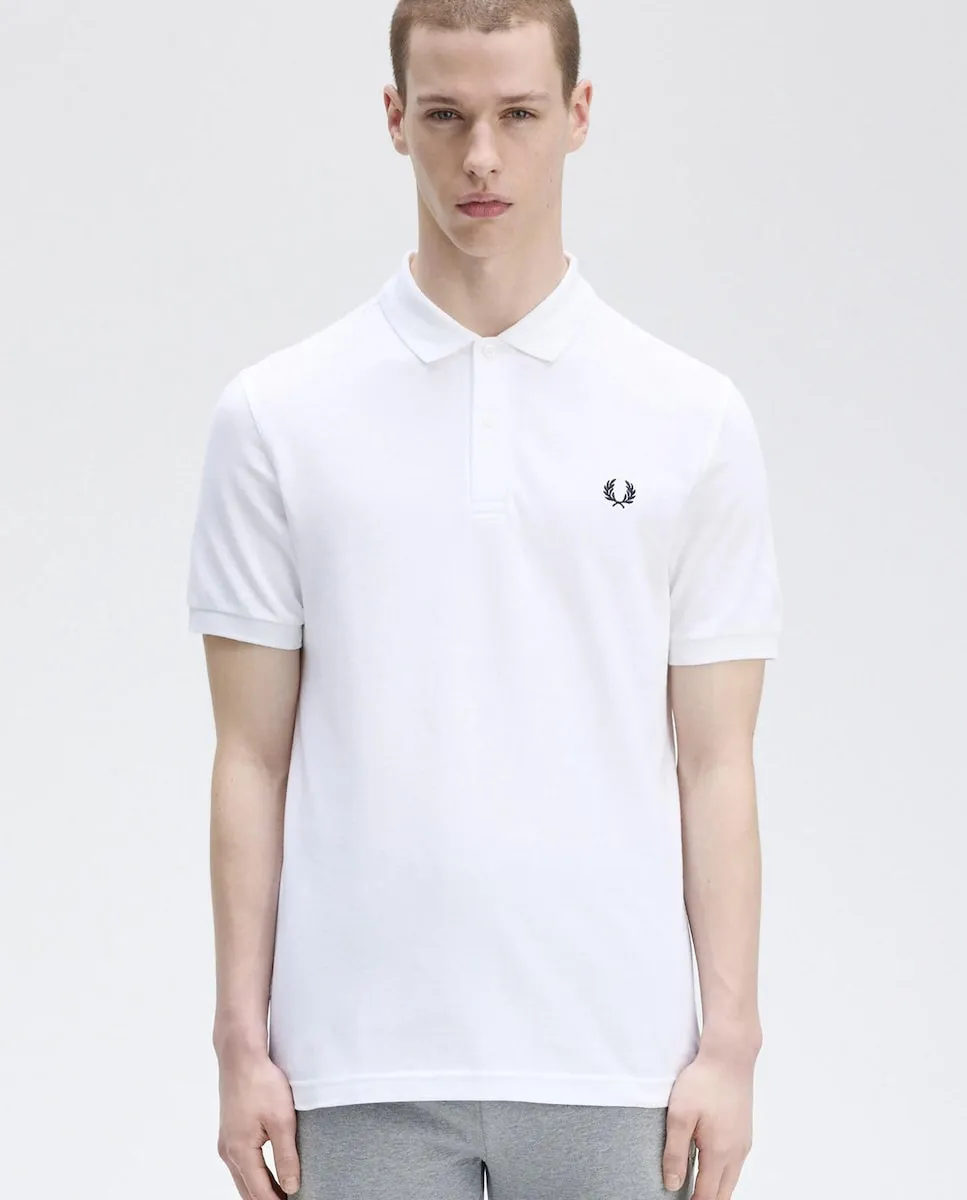 Мужская однотонная футболка поло из хлопкового пике с коротким рукавом Fred Perry, белый
Мужская однотонная футболка поло из хлопкового пике с коротким рукавом Fred Perry, белый