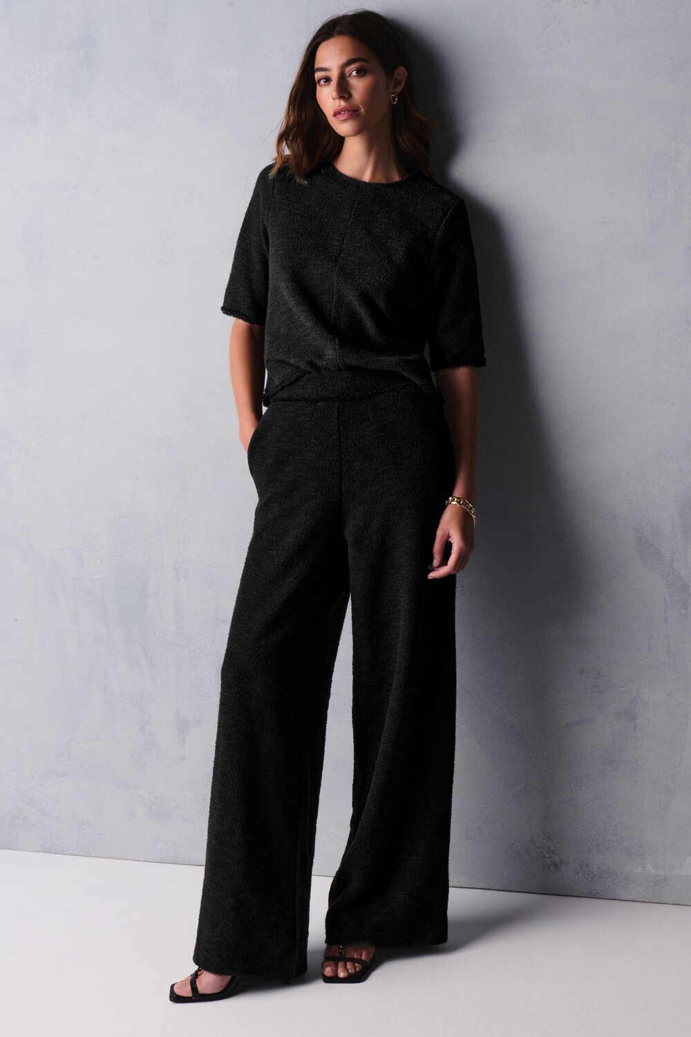 Широкие брюки из фактурной ткани букле Next, черный
Широкие брюки из фактурной ткани букле Next, черный