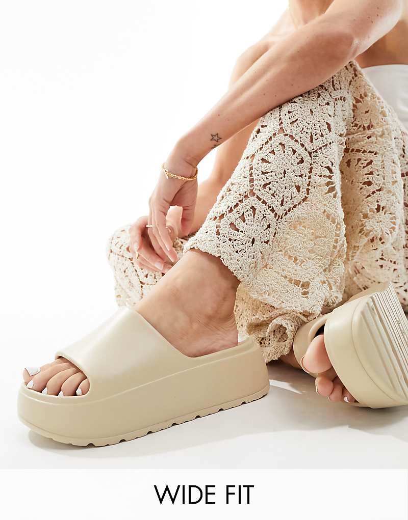 ASOS DESIGN Wide Fit – Freedom – Шлепанцы на толстой плоской платформе кремового цвета
ASOS DESIGN Wide Fit – Freedom – Шлепанцы на толстой плоской платформе кремового цвета