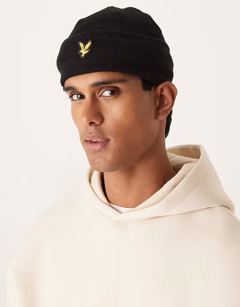 Шапочка из мериносовой шерсти угольно-черного цвета Lyle & Scott
Шапочка из мериносовой шерсти угольно-черного цвета Lyle & Scott