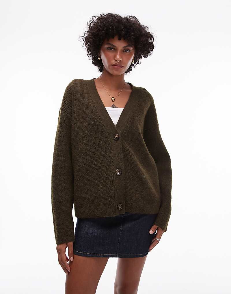 Topshop – Простой однотонный кардиган цвета хаки с ребристой отделкой и свободным кроем
Topshop – Простой однотонный кардиган цвета хаки с ребристой отделкой и свободным кроем