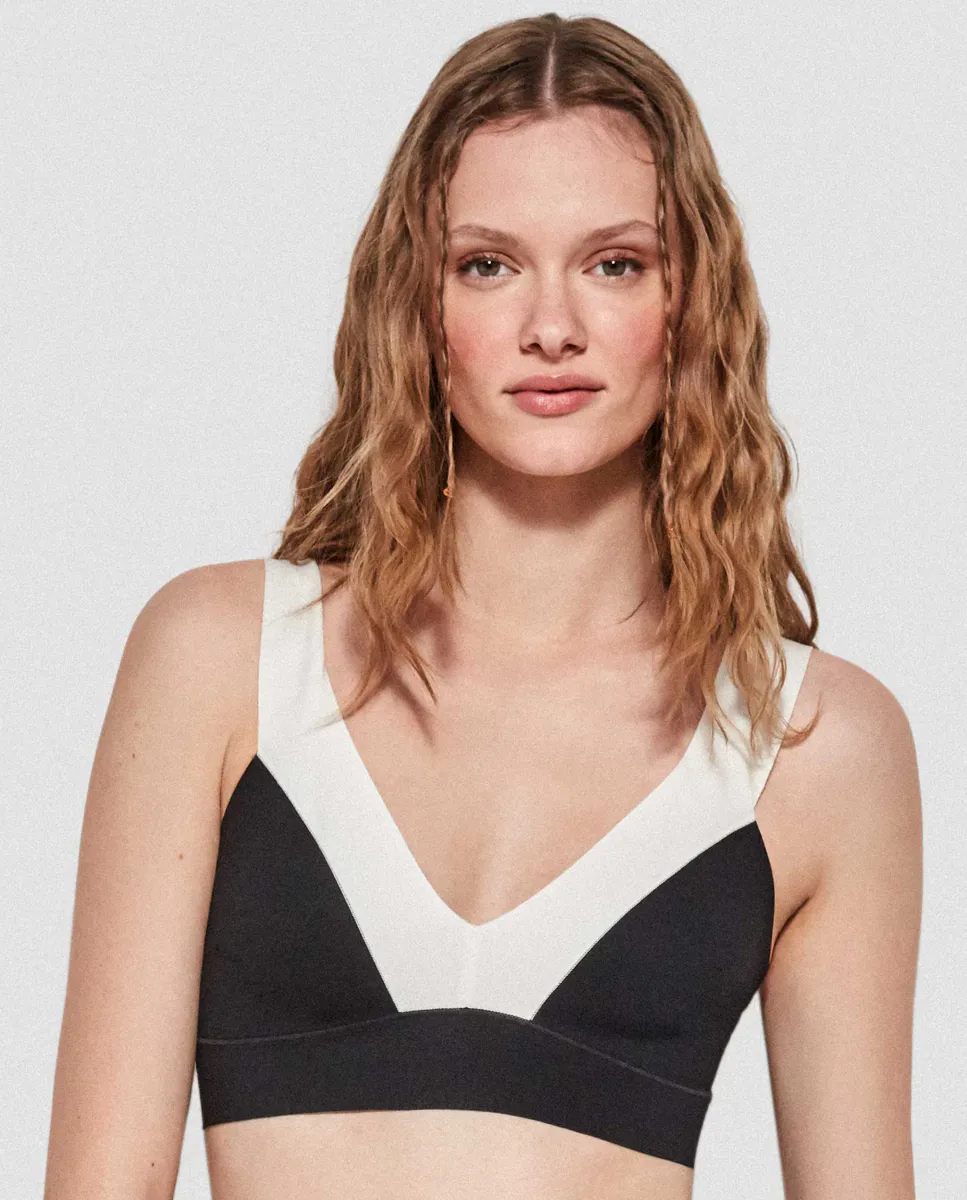 Верх бикини без поролона и двухцветной лазерной резки Gisela, черный
Верх бикини без поролона и двухцветной лазерной резки Gisela, черный