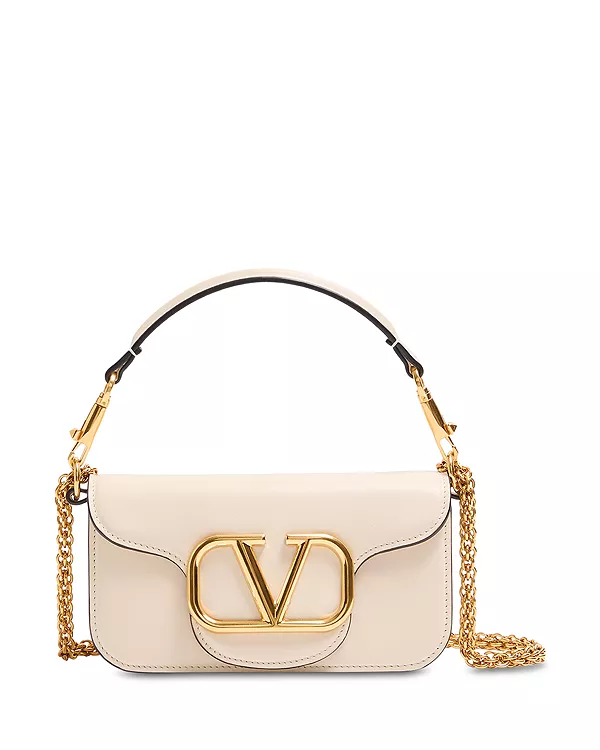 Маленькая сумка через плечо Locò vlogo Valentino Garavani, белый
Маленькая сумка через плечо Locò vlogo Valentino Garavani, белый