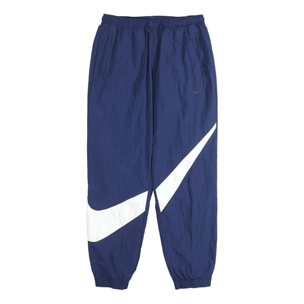 Брюки mens sportswear casual ankle banded sportspants blue Nike, синий 
Брюки mens sportswear casual ankle banded sportspants blue Nike, синий