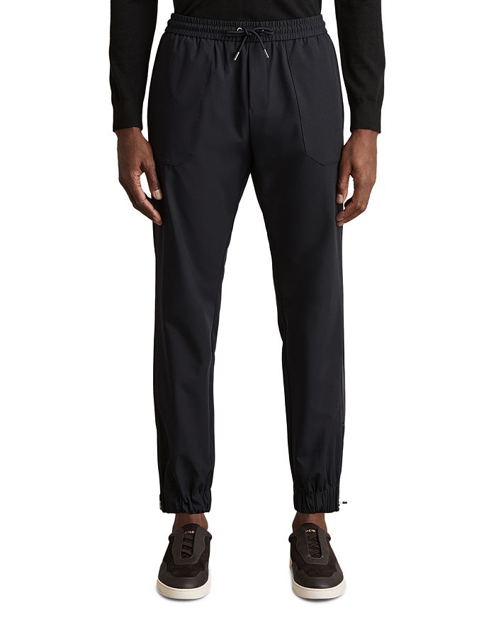 Свободные технические брюки на шнурке с манжетами REISS, синий
Свободные технические брюки на шнурке с манжетами REISS, синий