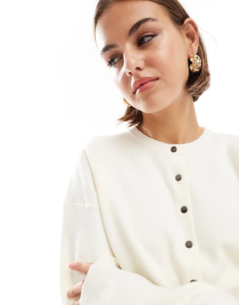 Кардиган ASOS DESIGN кремового цвета с круглым вырезом и ребристым подолом
Кардиган ASOS DESIGN кремового цвета с круглым вырезом и ребристым подолом