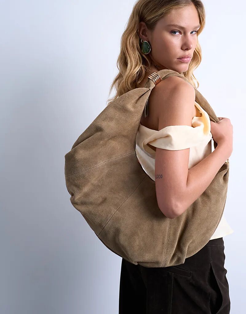 Сумка-лофер Topshop Sterling из натуральной замши бежевого цвета
Сумка-лофер Topshop Sterling из натуральной замши бежевого цвета