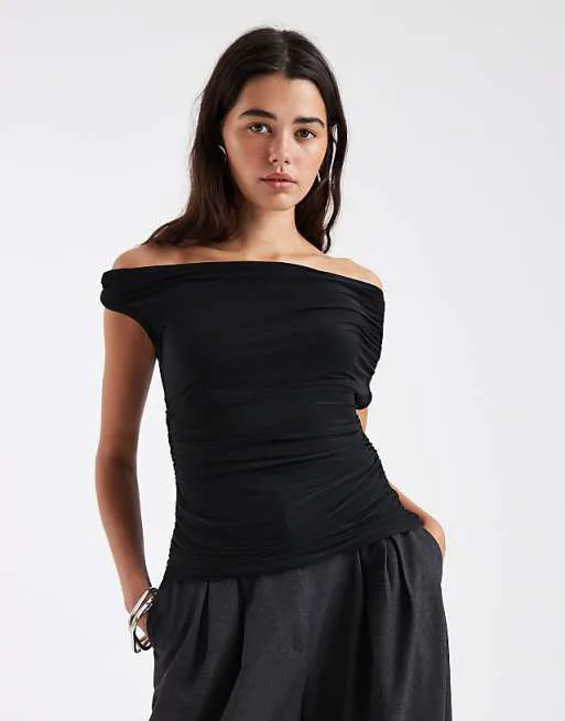 Черный облегающий топ с открытыми плечами и сборками ASOS DESIGN
Черный облегающий топ с открытыми плечами и сборками ASOS DESIGN